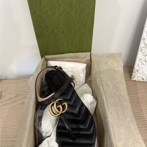 Gucci Black Quilted Sandals with Gold Emblem